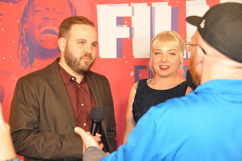 Filmmakers at the 42nd annual Denver Film Festival's red carpet opening night get interviewed by media.